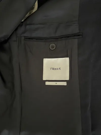 Après réparation 1 — Retouche Manteau/Veste Filippa K