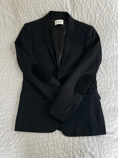 Après réparation 1 — Réparation Manteau/Veste Sandro