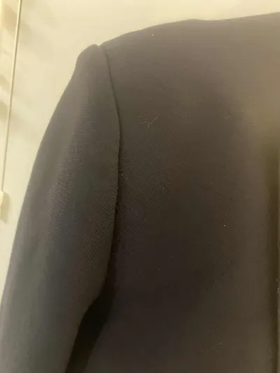 Après réparation 1 — Retouche Manteau/Veste