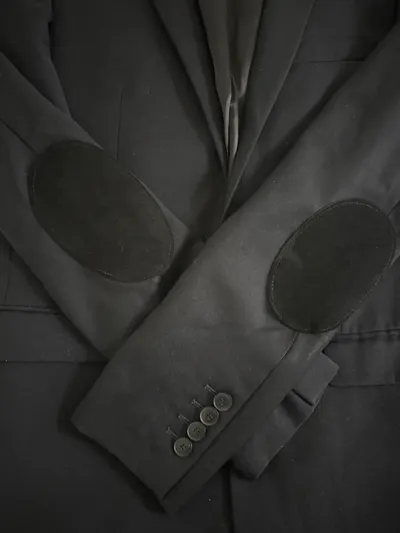Après réparation 2 — Réparation Manteau/Veste Sandro