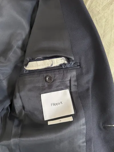 Avant réparation 1 — Retouche Manteau/Veste Filippa K