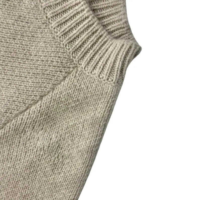Après : Réparation Maille (pull, gilet...) _Autre – par Clarsy Reparation à Paris